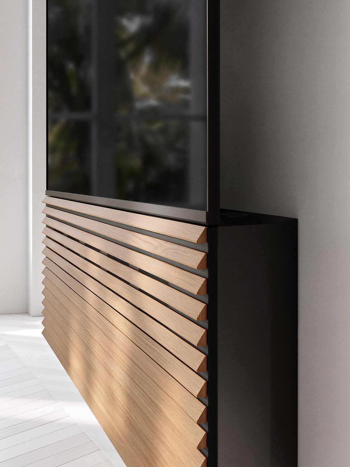 A TV and soundbar aligned flush on a wood cabinet with dual-axis adjustment
