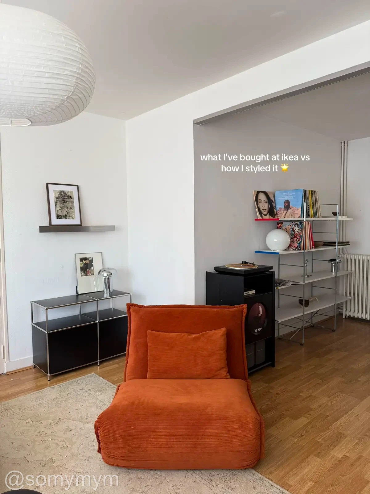 A personal listening corner with a white paper pendant